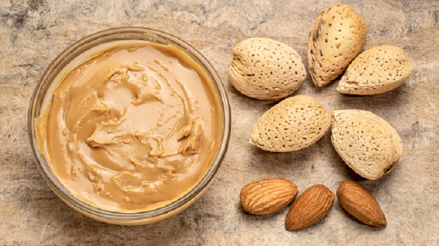 Can Dogs Eat Almond Butter? And What Amount Is Safe? - DodoWell - The Dodo